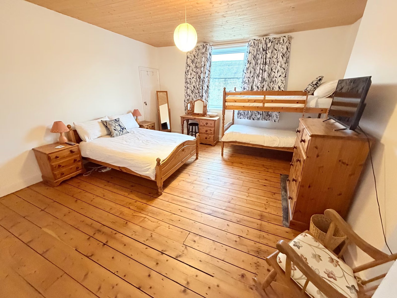 Bedroom with double bed and bunk bed